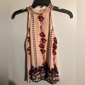 About a girl pinkish/crème blouse with floral and knit lace floral around neck